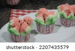 Small photo of Watermelon Bolu Kukus is a traditional Indonesian cake. It's called watermelon because it has a watermelon-like motif