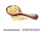 Small photo of Natural frankincense resin in wooden spoon on white background