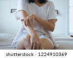 Small photo of Woman with rash or papule and scratch on her arm from allergies,Health allergy skin care problem,Psoriasis vulgaris