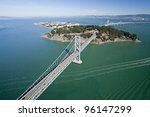 San Francisco Bay bridge traffic aerial view w Treasure Island
