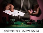 Small photo of Devastated gambler man losing a lot of money playing poker in casino, gambling addiction. Divorce, loss, ruin, debt, ludopata concept.