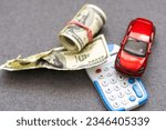Small photo of Car money and calculator. Payments and costs. Car insurance. Automobile collision damage waiver concepts. with protective gesture and icon of car. Protection of car. Business concept.