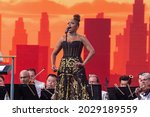 Small photo of NEW YORK, NY - AUGUST 21: Singer Jennifer Hudson performs during "We Love NYC: The Homecoming Concert" at the Great Lawn in Central Park on August 21, 2021 in New York City.