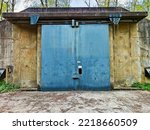 Small photo of Steel door of a abandoned munition storage
