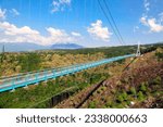 ishima Skywalk with Mount Fuji in background. Mishima Japan's longest suspension bridge. tourist attraction unseen, Shizuoka, Japan