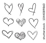 set of outline hand drawn heart ... | Shutterstock .eps vector #1044089860