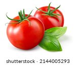 Tomato isolated. Tomato on white background. Two tomatoes with green basil leaves. Clipping path. Full depth of field.