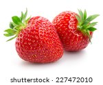 Two Strawberries Close Up On...