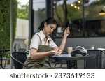 Small photo of Small business owner is struggling with economic crisis, declining sales, and revenue shortfalls, intensifying work pressure. The constant need for cash triggers worry, concern, and confusion.