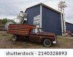 Small photo of Forsyth, Montana - May 28, 2020: a truck parked in front of a Nutrena Feeds business.