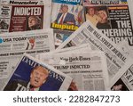 Small photo of New York NY USA_March 31, 2023 Headlines of newspapers in New York report on the previous days announcement of former President Donald Trump being indicted