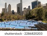 Small photo of New York NY USA-April 8, 2023 Pickleball players in the Wollman Ice Skating rink, converted into 14 pickleball courts