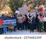 Small photo of New York NY USA-October 13, 2023 Baruch College and other CUNY students and their supporters rally and march. The protest was part of the Day of Rage called for by Hamas