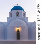 Small photo of Greek church at sunset
