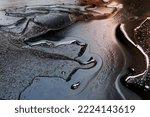 Small photo of crude oil surface background textured