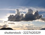 Small photo of beautiful cloud flouting in the sky