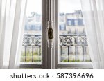 Sunny Summer Day Through a European Balcony Window in Paris France
