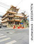 Small photo of Hatyai, Thailand - November 03, 2018: Chue-Chang temple unction street with temple building background.