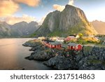 Beautiful sunrise over Hamnoy, fishermen village with the typical red houses of the Lofoten Islands, Norway