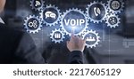 Small photo of VoIP Voice over IP. Businessman pressing virtual screen Voice over Internet Protocol