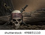 Pirate skull with two swords...