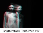 blurry scary portrait of a witch ghost girl in a white shirt. Black and white with 3D glitch virtual reality effect