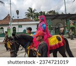 Small photo of A group of religious marchers celebrating the birthday of the Prophet Muhammad SAW in Central Java, Indonesia, 24 September 2023.