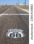 Small photo of Adrian, Texas, USA; October 25 2023: Midway point of historic old Route 66 between Chicago and Los Angeles (both 1139 miles). In the actual road.