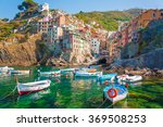 Riomaggiore is the first city of the Cique Terre sequence of hill cities, Liguria, Italy. It has a small dock that provides a good perspective of the shape imposed by the hills around the city.