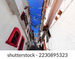 Small photo of Mexico, Scenic Taxco colonial architecture and cobblestone narrow streets in historic city center near Santa Prisca church.