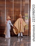 Small photo of Minna, Nigeria - October 29th 2022: Bride and Groom at hotel room before traditional wedding in Nigerian Yoruba Native attire.