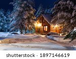 Rustic Log House  Snow Covered...