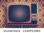 Small photo of Retro TV In A Room With Ugly 1970s Vintage Wallpaper