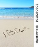 Ibiza Text Written In The Sand. ...