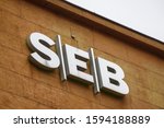 Small photo of RIGA, LATVIA. 29th November 2019. Logo of SEB bank on building. SEB is a Swedish financial group for corporate customers, institutions and private individuals