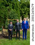 Small photo of RIGA, LATVIA. 2nd July 2021. Toshimitsu Motegi, Japanese Foreign Minister, Edgars Rinkevics (C) and Edvards Smiltens (R), Vice Mayor of Riga City, participates at joint tree planting event.