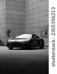 Small photo of Audi R8 gray background wall, Wroclaw, Poland, April 15, 2023.