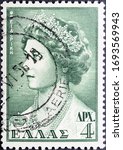 Small photo of MADRID, SPAIN - MARCH 13, 2020. Vintage stamp printed in Greece shows Frederica of Hanover, Queen consort of Greece from 1947 until 1964 as the wife of King Paul