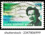Small photo of MADRID, SPAIN - JULY 29, 2023. Vintage stamp printed in United States of America shows Maria Goeppert Mayer (1906 - 1972), a German-born American theoretical physicist, and Nobel laureate in Physics