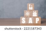 Small photo of SAP - Business process automation software and management software (SAP), Wooden block with VR screen SAP icon on office desk, Business, modern technology, internet and networking concept.