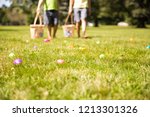 easter eggs hunt. Blurred silhouettes of children with baskets in hands. the concept of family fun at Easter.  blurred background. Cope space for your text