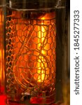 Small photo of 1, Nixie tube showing one red, macro shot