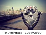 tourist binoculars at Liberty Island in front of Manhattan Skyline, vintage style, New York City, USA