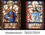 Small photo of ZAGREB, CROATIA - APRIL 07: St. Edward and the coat of arms of prebendary Eduardo de Talliana Vizek, stained glass in Zagreb cathedral dedicated to the Assumption of Mary in Zagreb on April 07, 2015