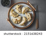 Gyoza Japanese korean dumplings on gray plate on the tabl. Top viewe