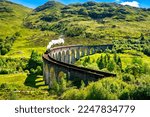 Small photo of Glenfinnan Railway Viaduct in Scotland with the steam train passing over