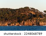 View of the rocky sea coast during golden hour, Costa Brava, Spain