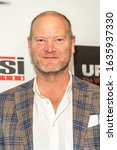 Small photo of Tommy Kendall attends "Uppity: The Willy T. Ribbs Story" Los Angeles Premiere at Petersen Museum, CA on February 4 2020