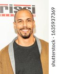 Small photo of Bryton James attends "Uppity: The Willy T. Ribbs Story" Los Angeles Premiere at Petersen Museum, CA on February 4 2020