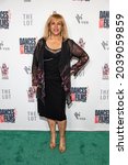 Small photo of Mary Reynard attends 24th Annual Dances with Films Festival World Premiere of "Four Cousins And A Christmas" at TCL Chinese Theater, Los Angeles, CA on September 8, 2021